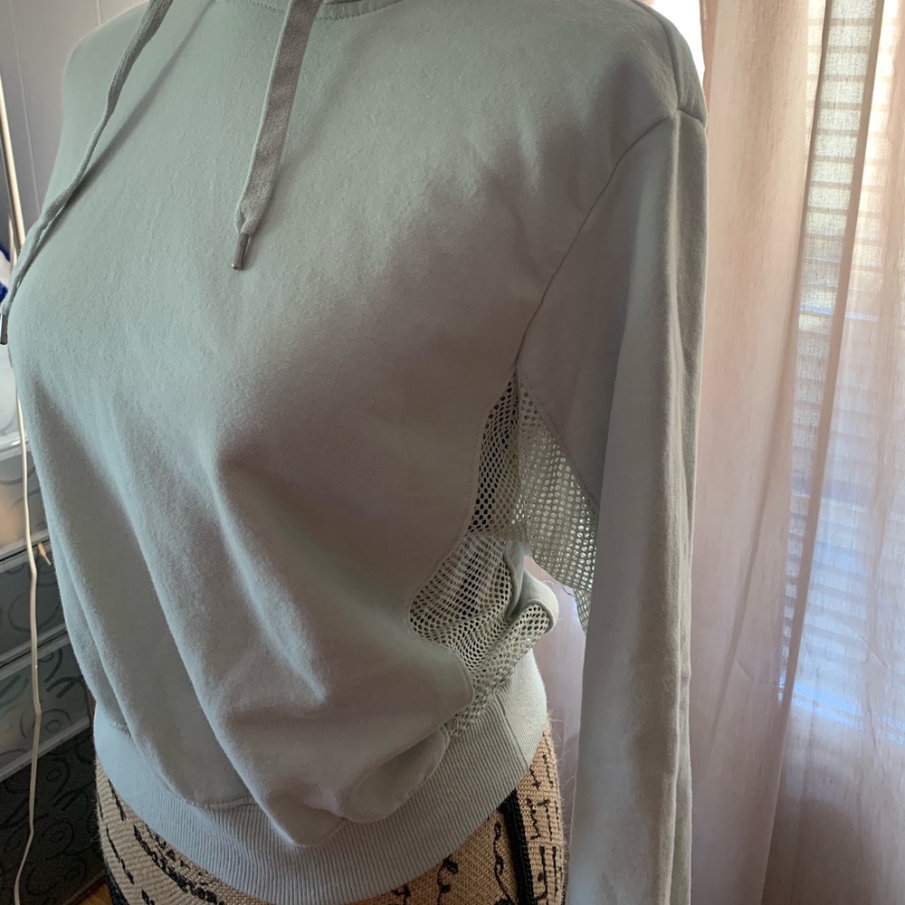 Mint green sweater with mesh in Size Small
